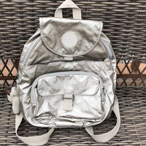 Kipling metallic backpack lots of zipped pockets